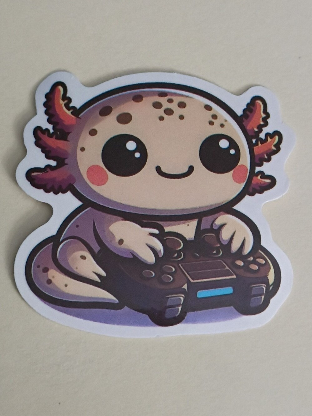 10/$10 Sticker - Axolotl Pink-Cream Freckled - Playing Video Game Controller